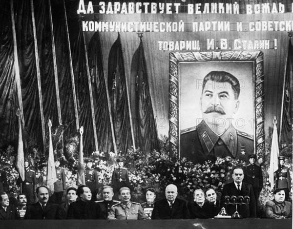 Ceremony at the bolshoi theater celebrating joseph stalin's 70th birthday, seated, from left to right, are  togliatti, budenni, kaganovich, suslov, mao tse-tung (zedong), bulganin, stalin, vassilevsky, khrushchev, ibarruri, georgiu-dej,shvernik, and malenkov, december 1949.