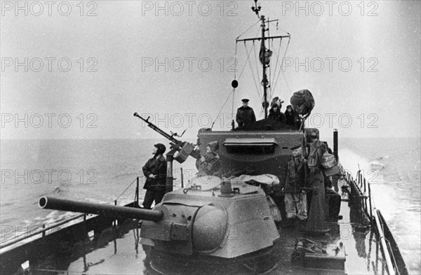 Red banner baltic fleet, a soviet battleship heading out on a combat assignment, june 1944.