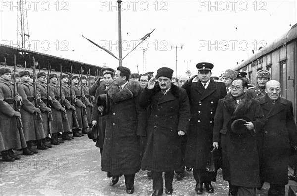 The north korean government delegation passing the honor guard at yaraslavl station upon their arrival in moscow, 1949(?), (left to right: kim il sung, a,i, mikoyan, a,a, gromyko, pak heun yung (pak hen yen).