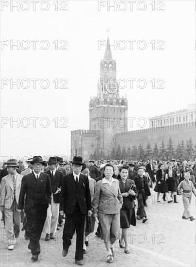 A delegation of representatives of cultural and public organizations of north korea, headed by writer li gi en, president of the korean society for cultural relations with the ussr, in red square in moscow, september 1946.