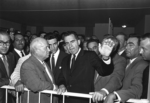 Soviet leader nikita khrushchev (left) and u,s, vice-president richard nixon at the opening of the u,s, trade and technology exhibition in moscow, ussr, 1959, the famous kitchen debate, leonid brezhnev, second from right, front.
