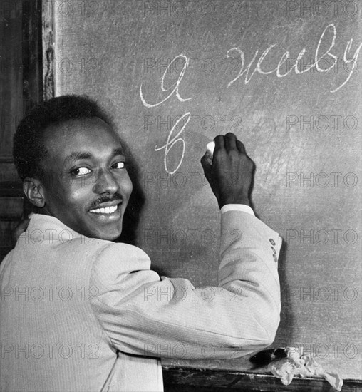 The peoples' friendship university in moscow, founded in 1960 and renamed the patrice lumumba university in 1961, mukhammed khamed salekh almek, a sudanese student, finds that conjugating russian verbs is not easy, 1960s.