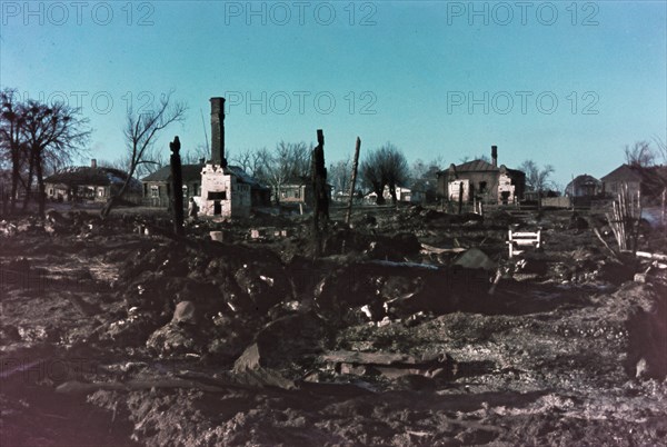 World war 2, photo taken by german soldier somewhere in occupied belorussia,  ruined homes.