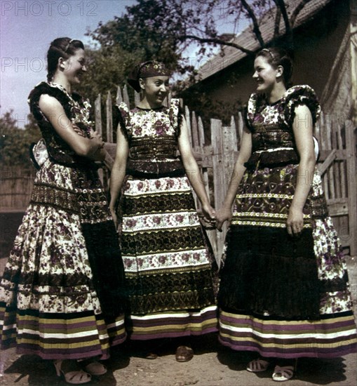 Women in traditional folk costumes of mezokovesd, hungary, 1950s.