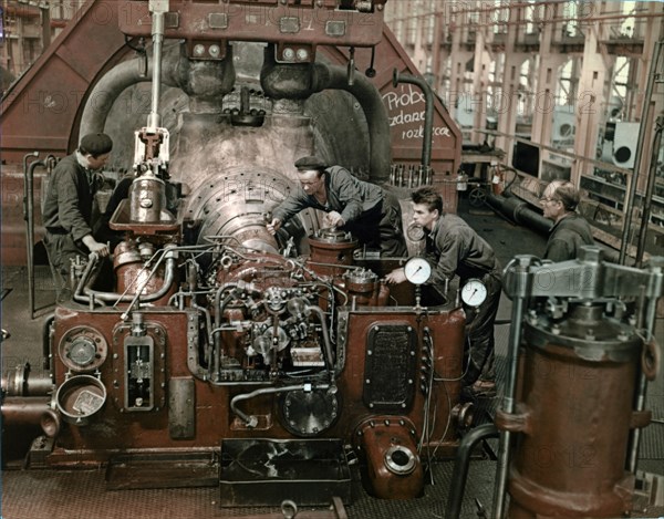 Workers assembling a turbine at the 'zamech' mechanical works in elblag, northern poland, 1960s.