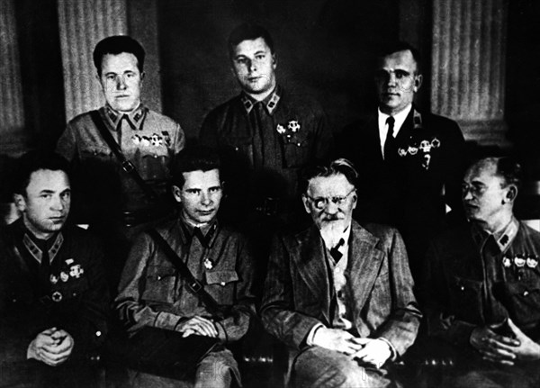 Moscow, october 7, 1939, chairman of the presidium of the ussr supreme soviet mikhail kalinin awards heroes of the battles on the khalkhin-gol river, from left to right: heroes of the soviet union s, p, denisov, i, n, dushkin, k, n, abramov, n, s, gerasimov, v, i, shevchenko and i, a, lakeyev.