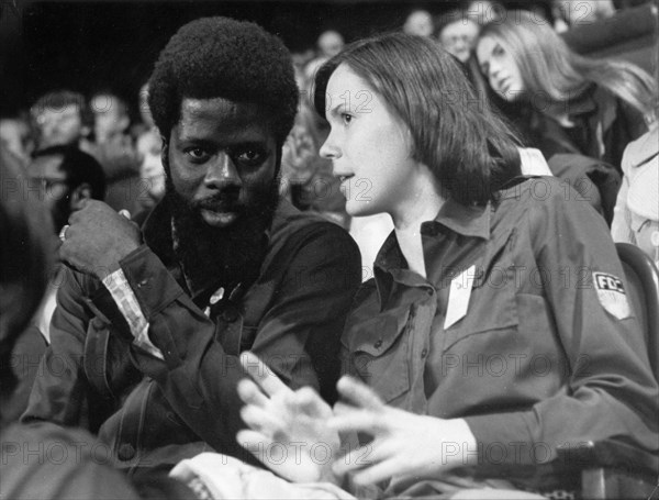 10th free german youth parliament in berlin, june 1976, on the left is emanuel remoe-dohery, regional secretary of the national youth league of the african people's congress of sierra leone, with doris kwittner, student of languages and delegate from neubrandenburg county.