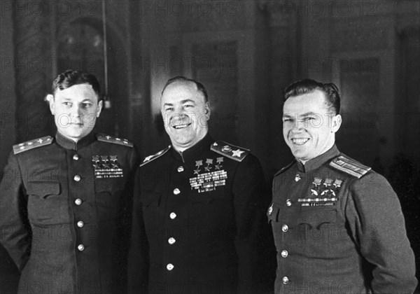 Heroes of the soviet union (l to r): soviet flying ace, a, pokryshkin, marshall of the soviet union g, zhukov, and ace pilot i, kozhedub, moscow, ussr,  june 1945.