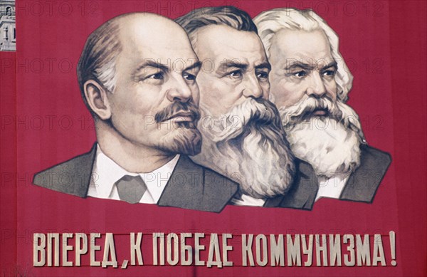 Soviet propaganda banner with likenesses of lenin, engels, and marx in leningrad, ussr, 1960s, the banner reads 'forward to the victory of communism!'.