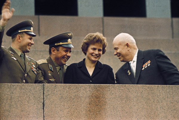 Nikita khrushchev with soviet cosmonauts gagarin, popov, and tereshkova on the rostrum of lenin's tomb in red square, moscow, ussr, june 22, 1963.