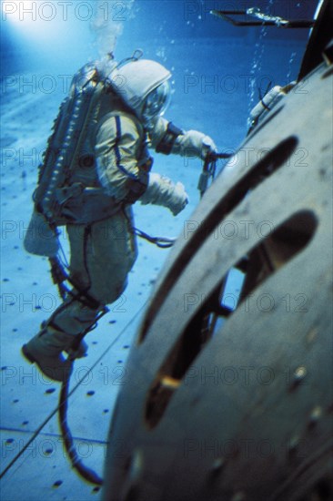 A soviet cosmonaut training in the hydro-laboratory of the gagarin training center, 1989.