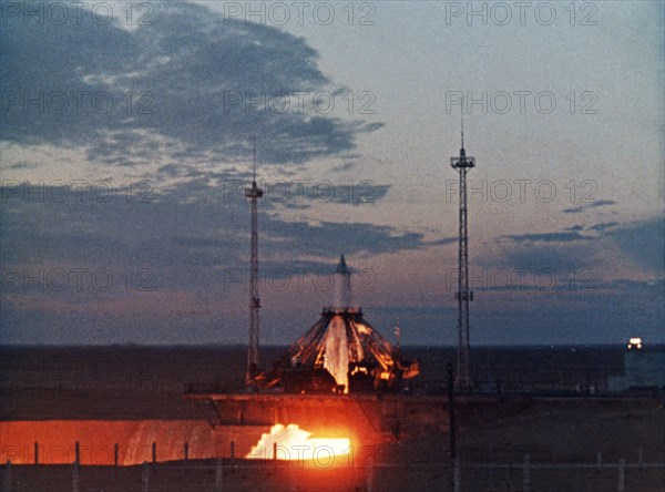 Launch of a rocket bearing the soviet space satellite, sputnik 1 in 1957.