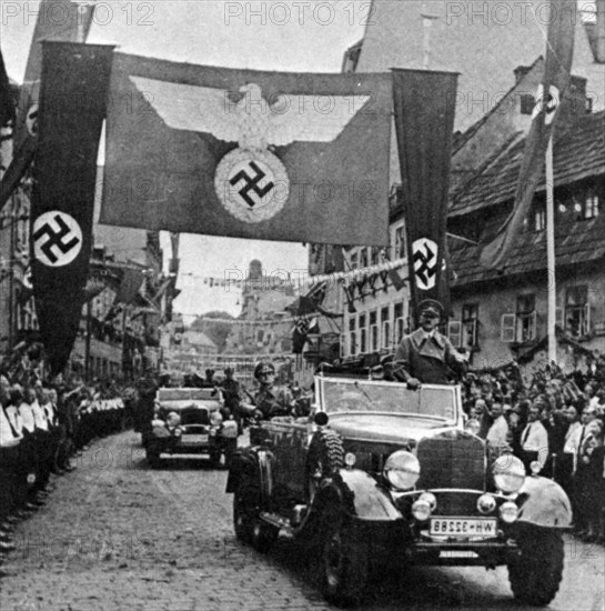 Hitler parading in czechoslovakia in 1939 in brno(?).