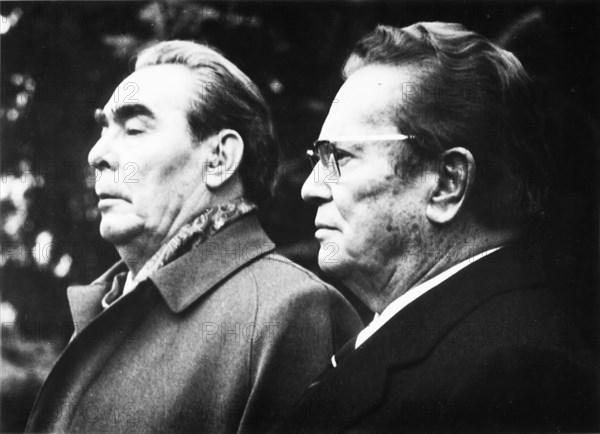 Tito and brezhnev during the intonation of national anthems during the welcoming ceremony in front of the white palace in belgrade, nov, 1976.