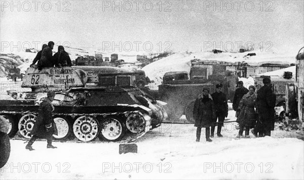 Battle of stalingrad, a soviet t-34 tank unit after it recaptured dubovaya ravine near stalingrad, the tank on the left bears the inscription 'chelyabinsk collective farmers' who paid for the tank from their savings, 1942 or 1943.