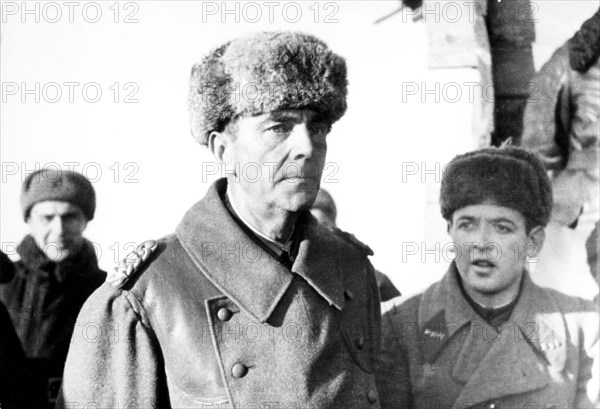 Nazi general field-marshal von paulus taken prisoner after he surrendered at the end of the battle of stalingrad on february 2, 1943, is escorted by soviet interpreter l, bezymensky across the village of zavarygino outside stalingrad.