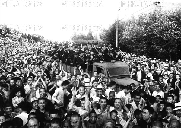 Operation august storm (battle of manchuria), soviet marines in harbin, manchuria, 1945, with jubilant residents after defeating the japanese army, world war 2.