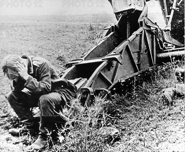 An exhausted nazi gunner taken prisoner in the battle at the kursk bulge which crippled hitler's army who never recovered, summer 1943.