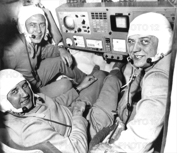 Soviet cosmonauts georgy dobrovolsk (rear), viktor patsayev (left), and vladislav volkov in the cabin of the soyuz 11 space craft, all three died on this mission in 1971.