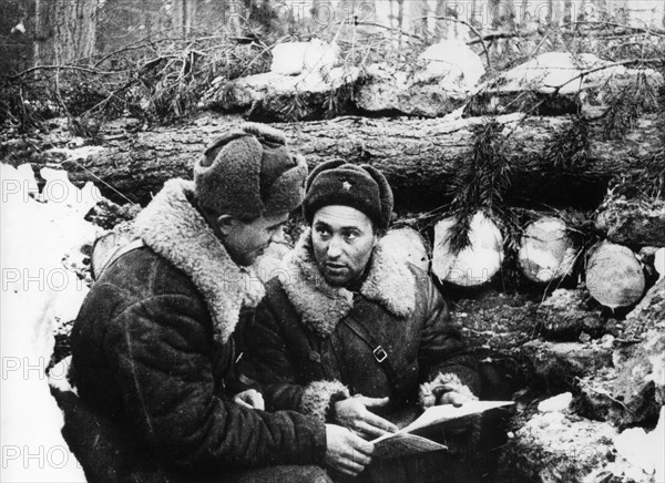 Battle of moscow, 1941, major alexander chapayev (right), the commander of an artillery battalion, and the battalion's comissar n, shakhov at the command post outside the town of yukhnov in the kaluga region.