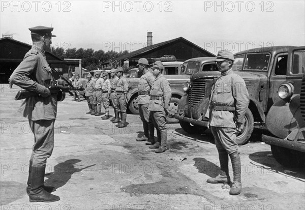 Operation august storm (battle of manchuria), a japanese transport column surrendering to soviet troops in harbin, manchuria, august 1945.