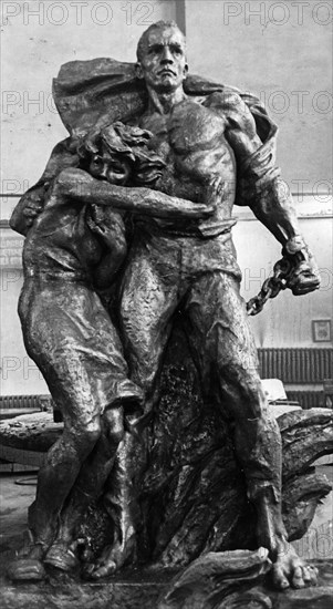 The two central figures, in bronze, of a monument to soviet civilians and soldiers who perished in the fascist concentration camp in mauthausen, austria, the monument, designed by v, tsigal of moscow and being cast at the monumentskulptura works in leningrad, will be erected on the grounds of the former camp near vienna, march 1957.