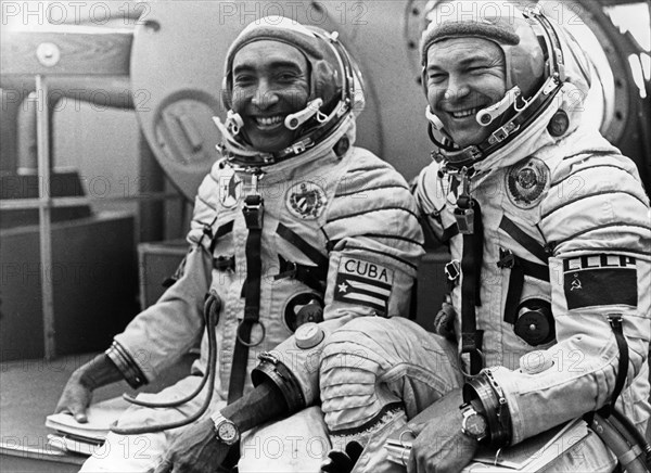 Crew of the soyuz-38 space mission to the salyut 6 space station, soviet cosmonaut colonel yuri viktorovich romanenko (right) and cuban researcher-cosmonaut lieutenant-colonel arnaldo tamayo mendez at the gagarin cosmonauts' training center, september 1980.