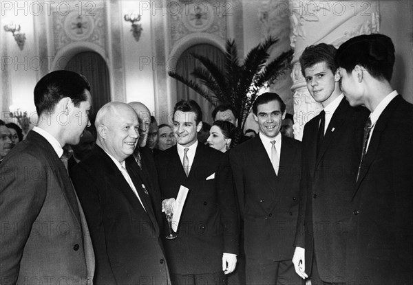 Nikita khrushchev hosting a reception for the participants of the tchaikovsky international violin and piano competition in the kremlin in moscow, april 14, 1958, american pianist van cliburn, second from right, won the first prize.