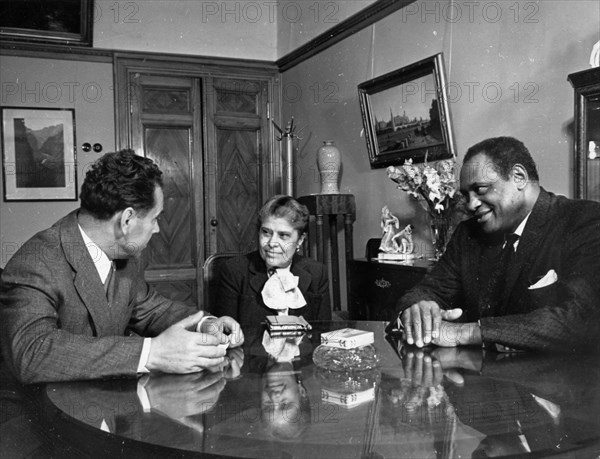 Ussr minister of culture, n,a, mikhailov receiving american singer and public figure paul robeson and his wife eslanda, moscow, ussr, august 1958.