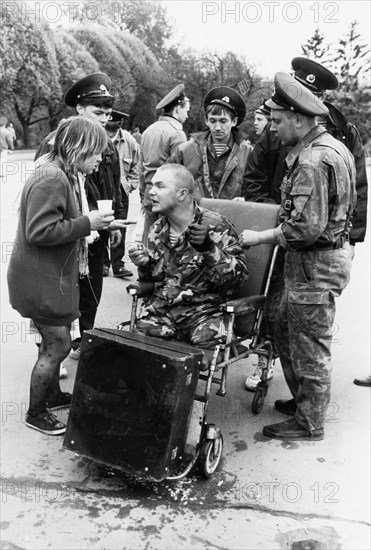 Russian frontier guards in gorky park for the first official frontier guards day celebration on may 28, 1994, this soldier was wounded on the tajik-afghan border.