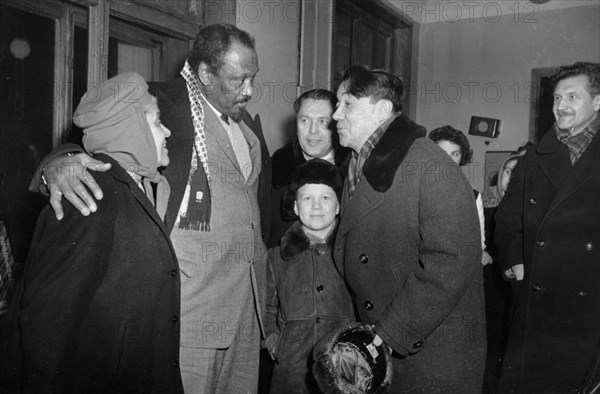 Paul robeson and his wife eslanda being greeted at vnukovo airport by m, kotov, executive secretary of the soviet peace committee, and soviet writers b, polevoi and v, zakharchenko, moscow, ussr, january 18, 1960.
