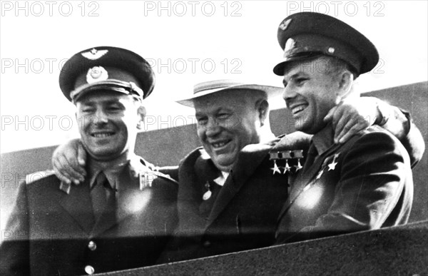 Moscow august 9, 1961, the rally of the moscow working people on the red squar , n s khruschev with heroes - cosmonauts, g s titov and y a gagarin on the lenin's tomb.