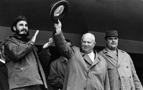 Fidel castro and nikita khrushchev responding to the cheers of the crowd at the opening of the summer sports season at the v,i, lenin central stadium in moscow, april 1963.