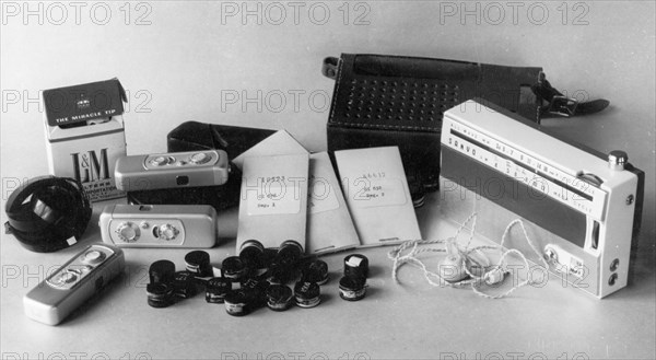 Penkovsky-wynne spy trial, may 1963, a sanyo portable transistor radio, minox cameras, film, and code books received by penkovsky from the british and american intelligence services.