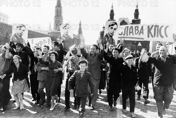People in red square celebrating the achievements of soviet cosmonaut, lieutenant-colonel valeri bykovsky and the vostok 5 space mission, june 1963.