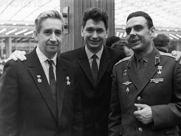 Voskhod 1, soviet cosmonauts (l to r) constantine feoktistov, boris yegorov, and vladimir komarov at a new year's eve gathering in moscow, december 31, 1964.