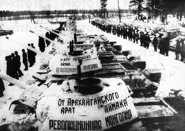 World war 2, soldiers of the 112th tank brigade receiving t-34 tanks made with money collected by the working people of the mongolian people's republic, 1943.