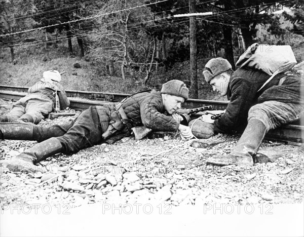 Partisans preparing to blow up a railroad track, the military victories of the soviet forces were backed up by the soviet partisans on the enemy-held terrain, partisan detachments existed almost throughout the territory held by the nazis.