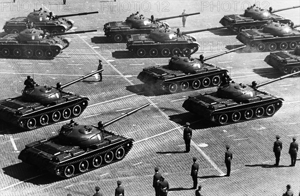 Soviet (t-55?) tanks during a november 7th military parade in red square in honor of the 51st anniversary of the great october revolution, moscow, ussr, 1968.