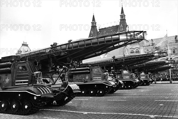 Tractors bearing scud a (ss1b) medium range tactical missiles in a november 7th military parade in red square in honor of the 51st anniversary of the great october revolution, moscow, ussr, 1968.