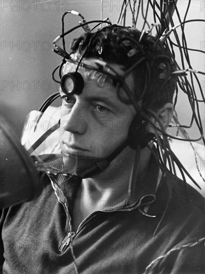 Cosmonaut vladislav volkov, flight engineer of soviet space mission soyuz 7, during a pre-flight medical check up, ussr, 1969.