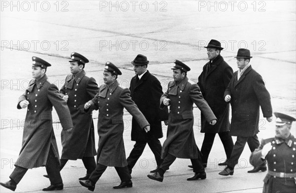 The crews of the soyuz 6, soyuz 7 and soyuz 8 space missions: vladimir shatalov, viktor gorbatko, valery kubasov, anatoly filipchenko, alexei yeliseyev, vladislav volkov, and georgi shonin arrive at vnukovo airport in moscow on october 22, 1969.