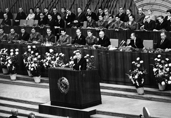 Leonid brezhnev speaking at a meeting in the kremlin palace in honor of all those who participated in the success of the soyuz 6, soyuz 7, and soyuz 8 space missions, october 22, 1969.