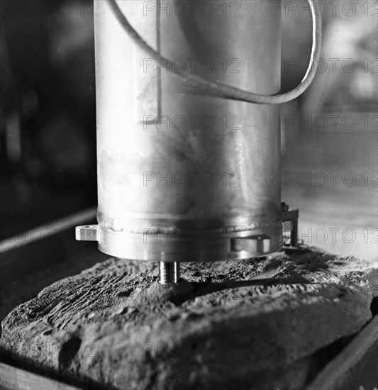 Luna 16, testing the boring mechanism of the luna 16 lunar lander in the laboratory, october 1970.