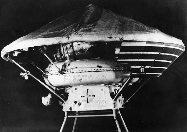 The landing capsule of the soviet space probe, mars 3 in the assembly shop with the braking cone attached.