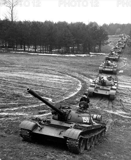 Carpathian military district, ussr, january 1972, a t-54 tank unit on the move during exercises.