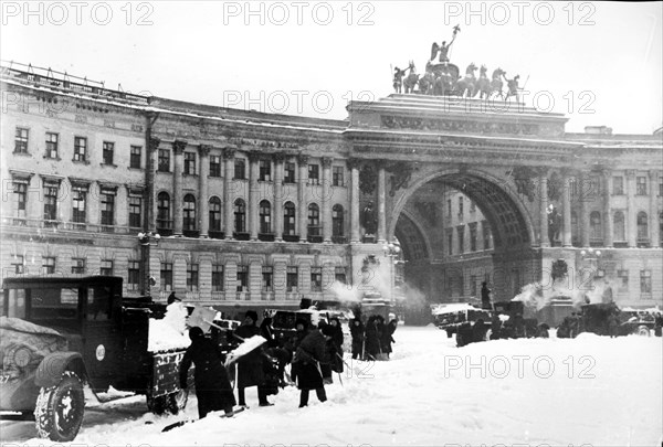 Leningrad's residents cleaning the the snow on uritski square in the days of the blockade.