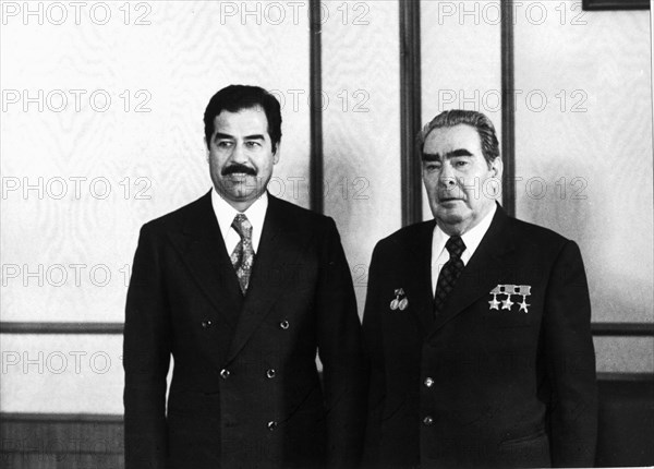 Leonid brezhnev (right) general secretary of the cpsu central committe with saddam hussein, deputy general secretary of the arab socialist renaissance party (baath party), kremlin, moscow, ussr, february 1977, saddam hussein on ' an official friendly visit to ussr'.