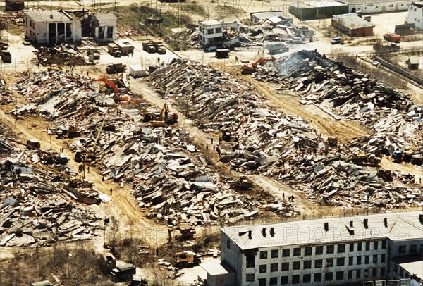Rubble and destruction after a bad earthquake in the town of neftegorsk, north sakhalin, may 1995, the quake left 377 people dead and 372 injured.