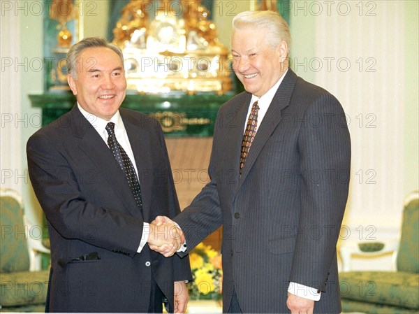 Russian federation, moscow, russian president boris yeltsin met his kazakh president nursultan nazarbayev at noon on thursday, boris yeltsin determined the biletaral relations between russia and kazakhstan as 'eternal frienship' and at the same time he said that there were some problems on caspian sea's status and baikonur cosmodrome rented by russia, boris yeltsin (right) and nursultan nazarbayev seen shaking hands during their meeting prior the talks, april 9, 1998.